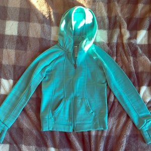 A Teal Sweatshirt. Not used; Although no tag.